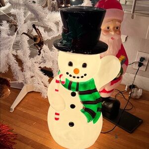 Festive Snowman Holiday Decoration with Black Hat and Green Scarf